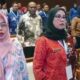 Kepala Diskumindag Kota Sukabumi, Een Rukmini, saat menghadiri Seminar